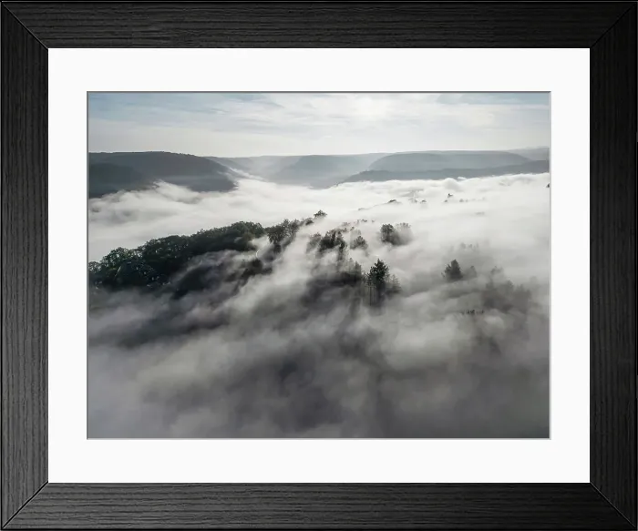 Framed Print : Aerial view at morning fog near Traben-Trarbach, Moselle valley, Rhineland-Palatinate, Germany Framed Print : Aerial view at morning fog near Traben-Trarbach, Moselle valley, Rhineland-Palatinate, Germany