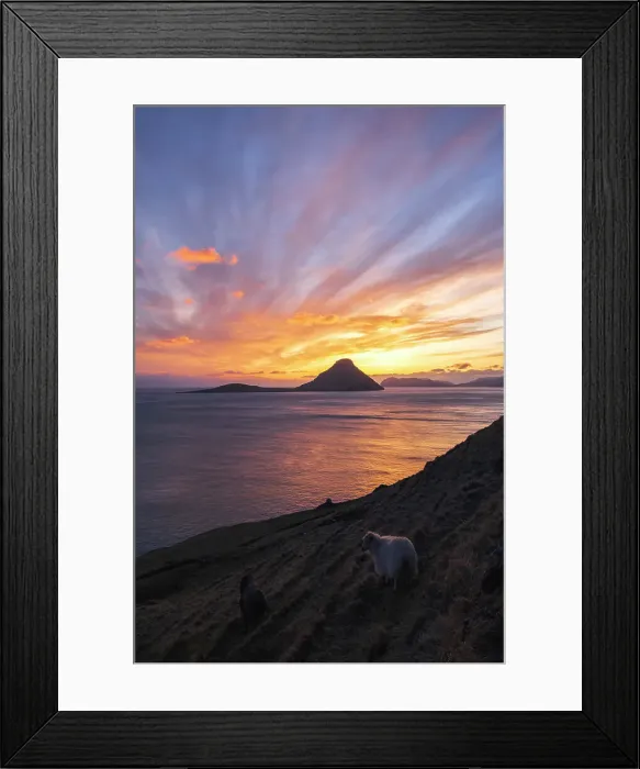 Framed Print : A spectacular sunset in Velbastaður. Island of Streymoy. The island of Koltur in the background. Faroe Islands