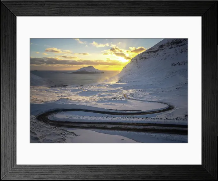 Framed Print : The scenic road in Norðradalur at sunset. Island of Streymoy. In the background the island of Koltur. Faroe Islands Framed Print : The scenic road in Norðradalur at sunset. Island of Streymoy. In the background the island of Koltur. Faroe Islands