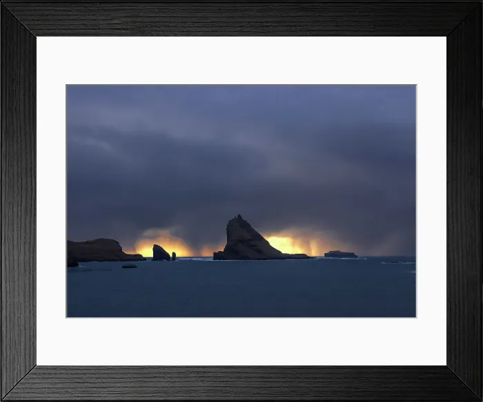 Framed Print : Tindholmur islet and Drangarnir sea stacks in a stormy day at sunset. Island of Vagar. Faroe Islands Framed Print : Tindholmur islet and Drangarnir sea stacks in a stormy day at sunset. Island of Vagar. Faroe Islands