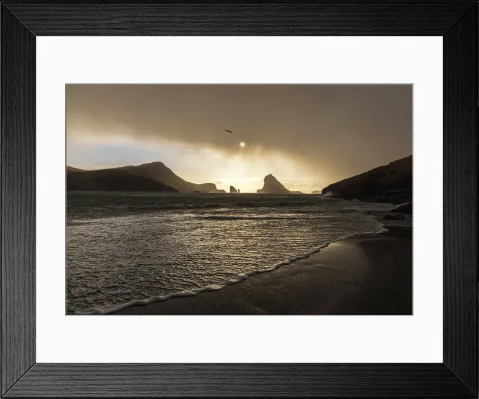 Framed Print : Tindholmur islet and Drangarnir sea stacks seen from the beach of Bour. Island of Vagar. Faroe Islands
