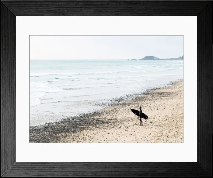 Framed Print : A surfer on the St Ouens Bay beach, Jersey, Channel Islands Framed Print : A surfer on the St Ouens Bay beach, Jersey, Channel Islands
