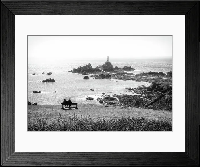 Framed Print : View towards Corbiere Lighthouse and causeway at the low tide, Jersey, Channel Islands Framed Print : View towards Corbiere Lighthouse and causeway at the low tide, Jersey, Channel Islands