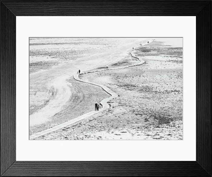 Framed Print : People walking along the winding causeway at low tide from the quay side to Elizabeth Castle, Jersey, Channel Islands Framed Print : People walking along the winding causeway at low tide from the quay side to Elizabeth Castle, Jersey, Channel Islands