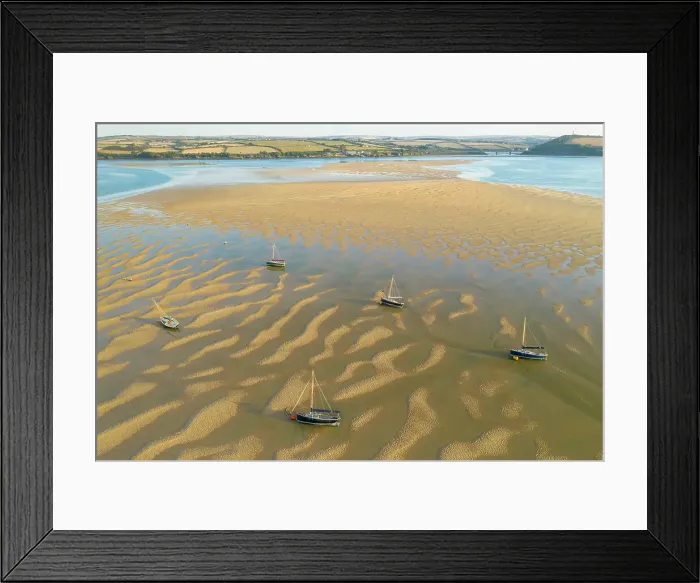 Framed Print : Aerial image of boats stranded on sand bars in the Camel Estuary, Rock, Cornwall, England. Summer (August) 2022 Framed Print : Aerial image of boats stranded on sand bars in the Camel Estuary, Rock, Cornwall, England. Summer (August) 2022