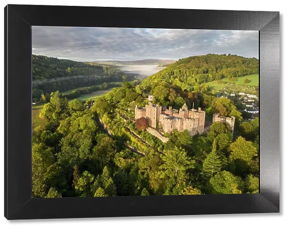 Aerial view of Dunster Castle, Exmoor National Park, Somerset, England. Autumn (October) 2022