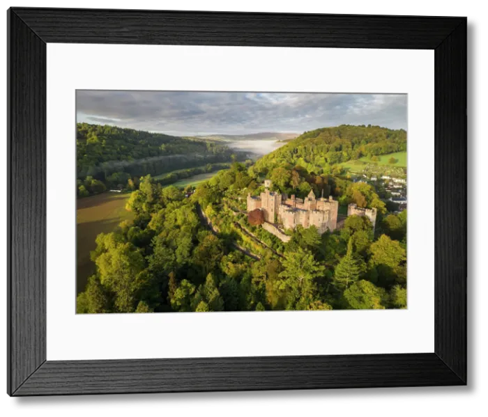 Framed Print : Aerial view of Dunster Castle, Exmoor National Park, Somerset, England. Autumn (October) 2022 Framed Print : Aerial view of Dunster Castle, Exmoor National Park, Somerset, England. Autumn (October) 2022