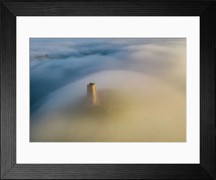 Framed Print : Aerial view of St Michael's Tower on Glastonbury Tor at dawn on a misty morning, Glastonbury, Somerset, England. Autumn (November) 2022 Framed Print : Aerial view of St Michael's Tower on Glastonbury Tor at dawn on a misty morning, Glastonbury, Somerset, England. Autumn (November) 2022