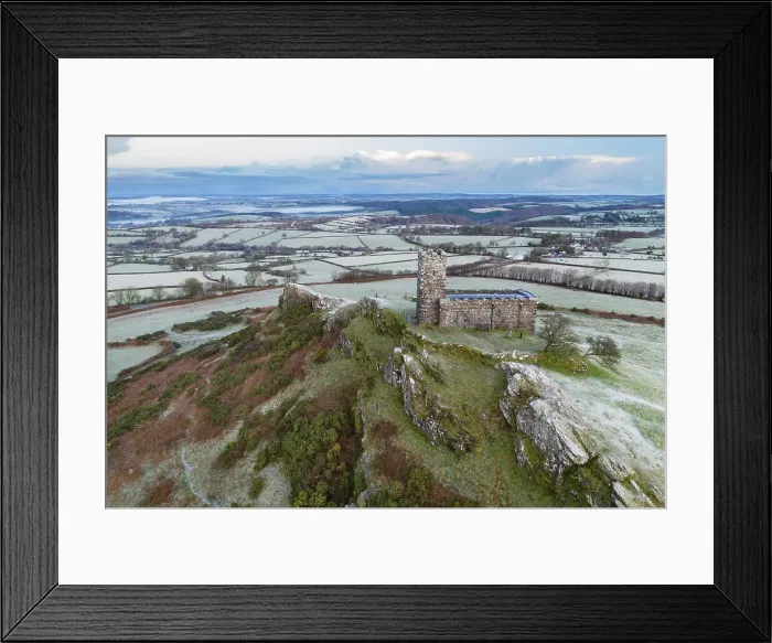 Framed Print : Brentor Church on a cold, frosty morning in Dartmoor National Park, Devon, England. Winter (December) 2022