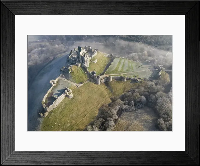 Framed Print : Aerial view of Corfe Castle on a chill winter morning, Dorset, England. Winter (February) 2023