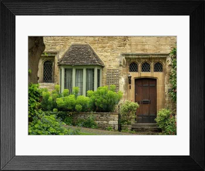 Framed Print : Ancient house front in the Cotswolds town of Burford, Gloucestershire, England. Spring (May) 2019 Framed Print : Ancient house front in the Cotswolds town of Burford, Gloucestershire, England. Spring (May) 2019