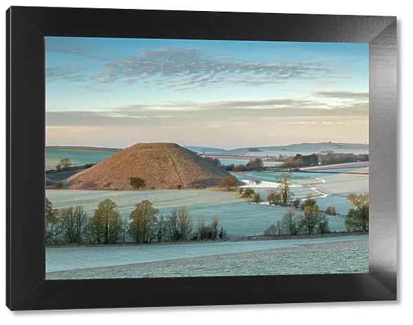 Frosty winter morning at Silbury Hill in Wiltshire, England. Winter (February) 2023