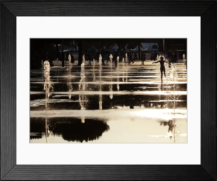 Framed Print : A boy plays in the fountains, Promenade du Paillon, Nice, Provence-Alpes-Cote d'Azur, France Framed Print : A boy plays in the fountains, Promenade du Paillon, Nice, Provence-Alpes-Cote d'Azur, France