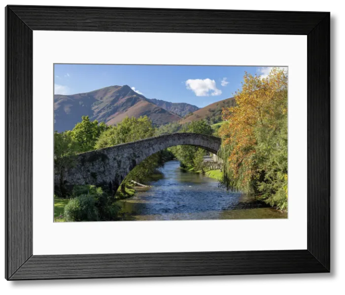 Framed Print : An old stone bridge crosses the Nive des Aldudes, Saint-Etienne-de-Baigorry, Lower Navarre, Pyrenees-Atlantiques, Nouvelle Aquitaine, France Framed Print : An old stone bridge crosses the Nive des Aldudes, Saint-Etienne-de-Baigorry, Lower Navarre, Pyrenees-Atlantiques, Nouvelle Aquitaine, France