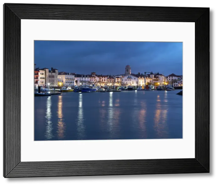 Framed Print : Saint-Jean-de-Luz, illuminated at dusk, Pyrenees-Atlantiques, Nouvelle Aquitaine, France Framed Print : Saint-Jean-de-Luz, illuminated at dusk, Pyrenees-Atlantiques, Nouvelle Aquitaine, France
