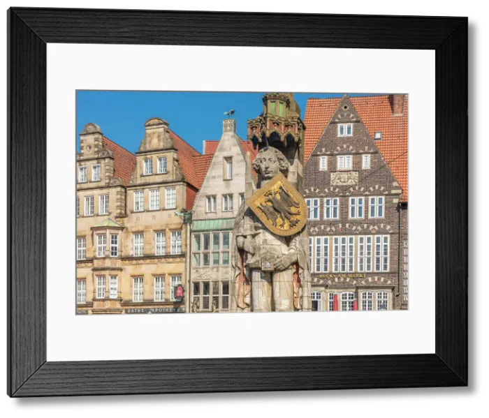 Framed Print : Statue of Bremer Roland and historic houses on the market square, Bremen, Germany Framed Print : Statue of Bremer Roland and historic houses on the market square, Bremen, Germany