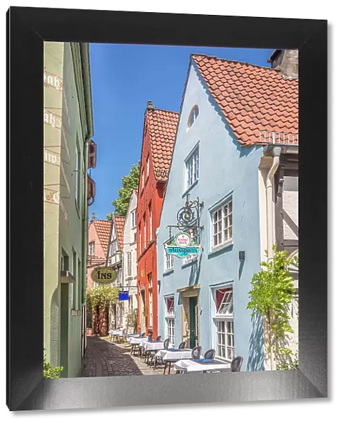 Alley with colorful houses in the historic Schnoor district, Bremen, Germany
