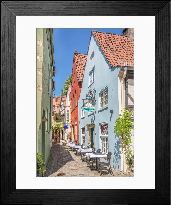 Framed Print : Alley with colorful houses in the historic Schnoor district, Bremen, Germany Framed Print : Alley with colorful houses in the historic Schnoor district, Bremen, Germany