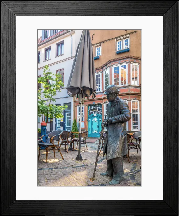 Framed Print : Bronze statue Heini Holtenbeen at street cafe in the historic Schnoor district, Bremen, Germany Framed Print : Bronze statue Heini Holtenbeen at street cafe in the historic Schnoor district, Bremen, Germany