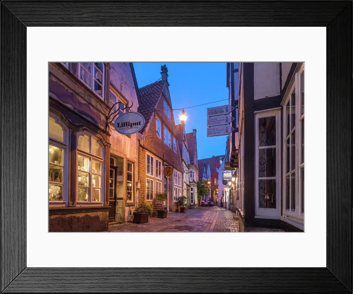Framed Print : Alley in the historic Schnoor district in the evening, Bremen, Germany Framed Print : Alley in the historic Schnoor district in the evening, Bremen, Germany