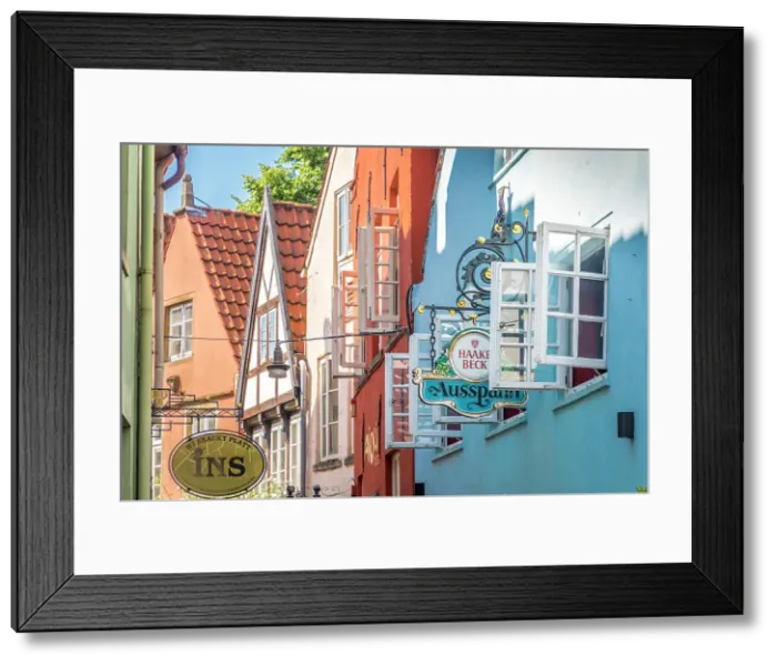 Framed Print : Colorful houses in the historic Schnoor district, Bremen, Germany Framed Print : Colorful houses in the historic Schnoor district, Bremen, Germany