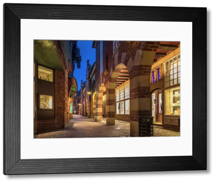 Framed Print : Illuminated Boettcherstrasse in the evening, Bremen, Germany Framed Print : Illuminated Boettcherstrasse in the evening, Bremen, Germany