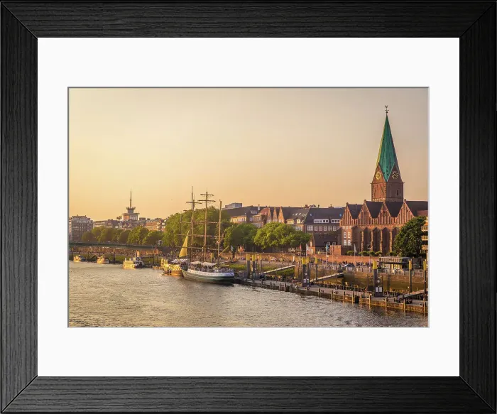 Framed Print : Martini pier on a summer evening with St. Martini Church, Bremen, Germany Framed Print : Martini pier on a summer evening with St. Martini Church, Bremen, Germany