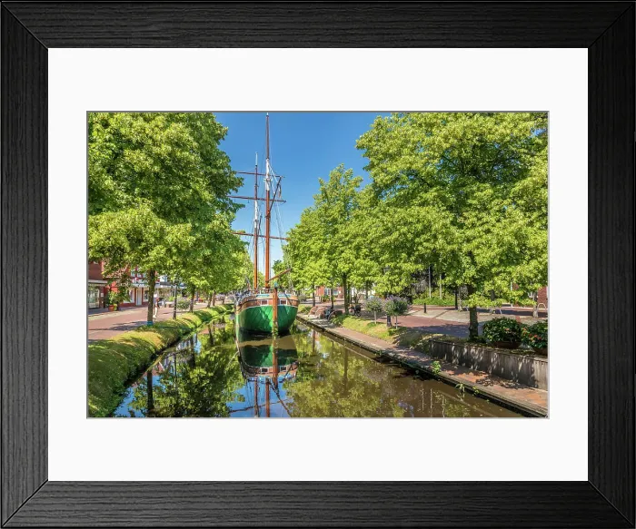 Framed Print : Historical cargo glider Margaretha on the main canal in the old town of Papenburg, Emsland, Lower Saxony, Germany Framed Print : Historical cargo glider Margaretha on the main canal in the old town of Papenburg, Emsland, Lower Saxony, Germany