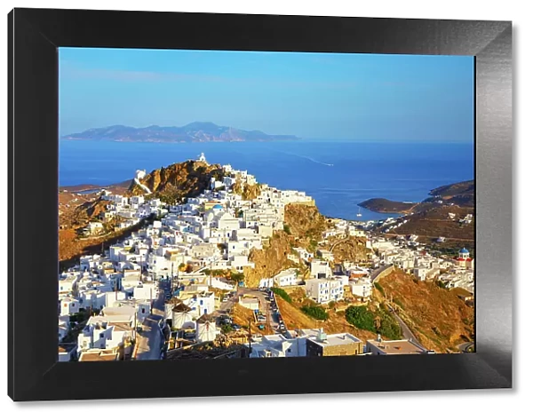 View of Chora village and the port of Livadi and Sifnos island in the distance, Chora, Serifos Island, Cyclades Islands, Greece