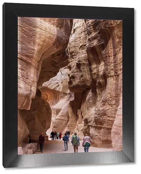 The Siq, a narrow canyon passage leading to The Treasuary, Petra, Jordan
