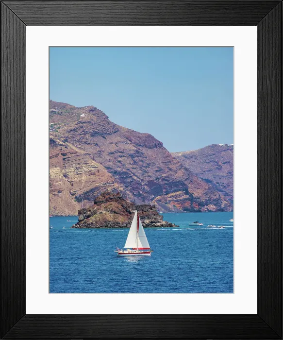 Framed Print : Sailboat at the caldera near Oia Village, Santorini or Thira Island, Cyclades, Greece Framed Print : Sailboat at the caldera near Oia Village, Santorini or Thira Island, Cyclades, Greece
