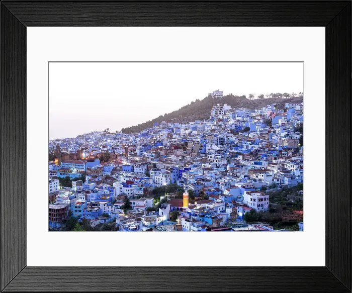 Framed Print : High angle view of the fairy tale blue city of Chefchaouen at dusk, Morocco Framed Print : High angle view of the fairy tale blue city of Chefchaouen at dusk, Morocco