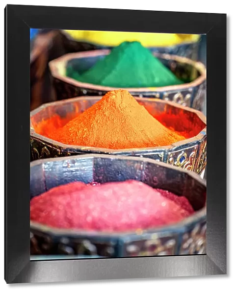 Colorful scented spices in cone shape in a row, Marrakesh, Morocco