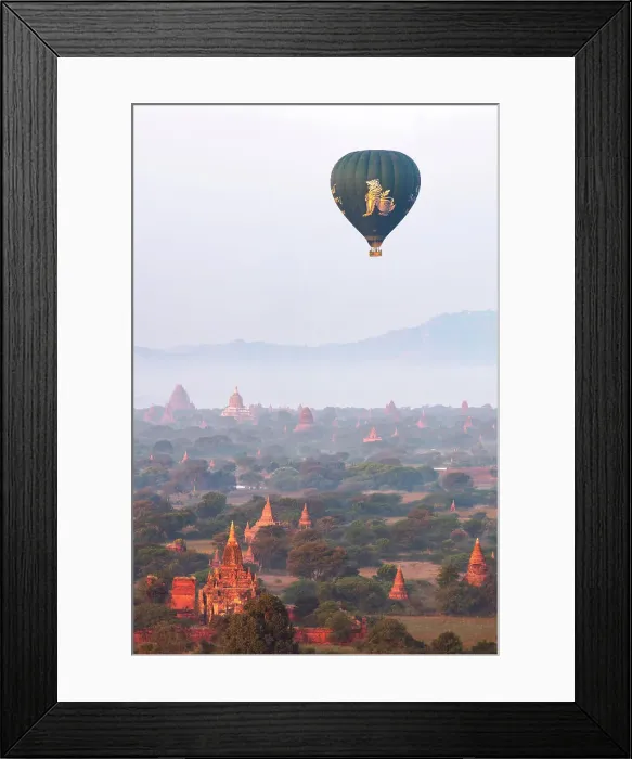 Framed Print : Hot air baloon flying at sunrise over the Bagan Valley archaeological area temples, Old Bagan, Mandalay Region, Myanmar. Bagan was declared a UNESCO World Heritage Site in 2019 Framed Print : Hot air baloon flying at sunrise over the Bagan Valley archaeological area temples, Old Bagan, Mandalay Region, Myanmar. Bagan was declared a UNESCO World Heritage Site in 2019