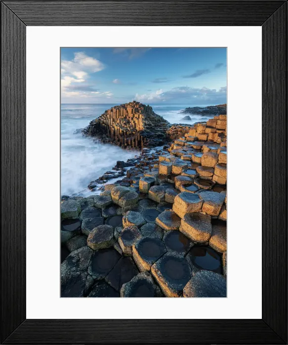 Framed Print : Basalt columns on the Giant's Causeway World Heritage Site on the Causeway Coast, Bushmills, County Antrim, Northern Ireland. Autumn (November) 2022