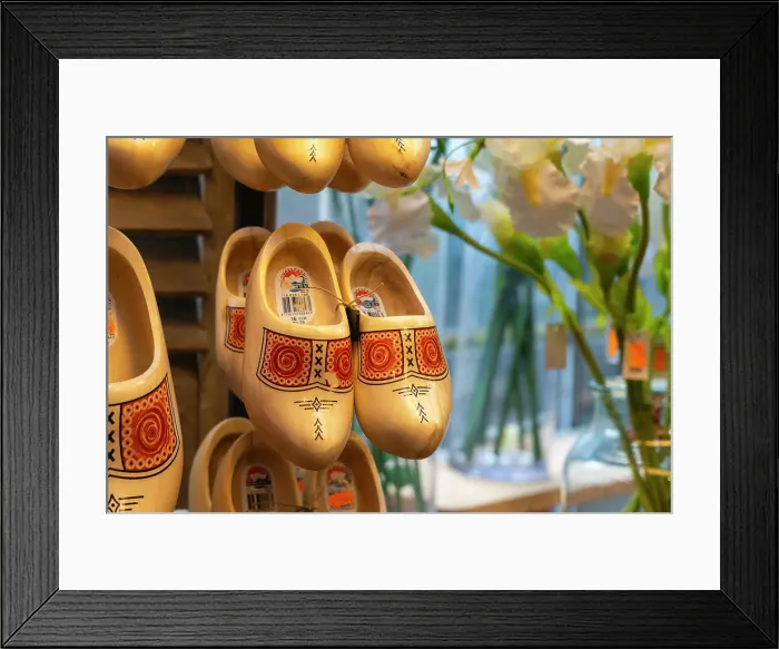 Framed Print : Pair of Dutch clogs hanging on display in shop, Amsterdam Framed Print : Pair of Dutch clogs hanging on display in shop, Amsterdam