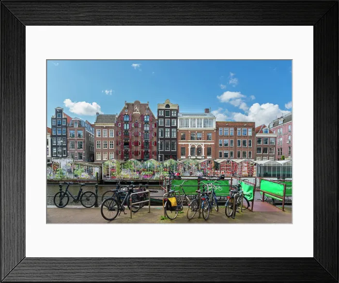 Framed Print : Bicycles standing against typical houses and floating flower market near Singel canal, Amsterdam, Netherlands Framed Print : Bicycles standing against typical houses and floating flower market near Singel canal, Amsterdam, Netherlands