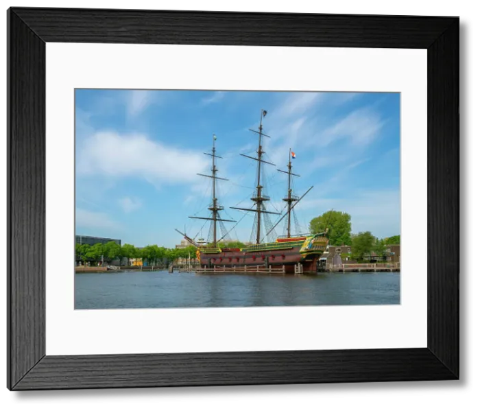 Framed Print : Replica of The Amsterdam moored in river against sky, Community Marineterrein, Amsterdam, Netherlands