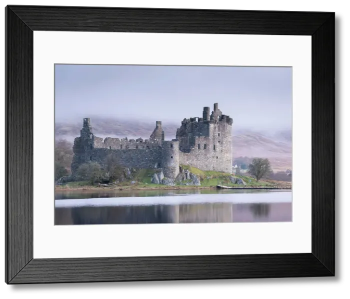 Framed Print : The ruins of Kilchurn Castle reflected in Loch Awe at dawn on a misty morning in the Scottish Highlands, Argyll and Bute, Scotland. Winter (March) 2017 Framed Print : The ruins of Kilchurn Castle reflected in Loch Awe at dawn on a misty morning in the Scottish Highlands, Argyll and Bute, Scotland. Winter (March) 2017