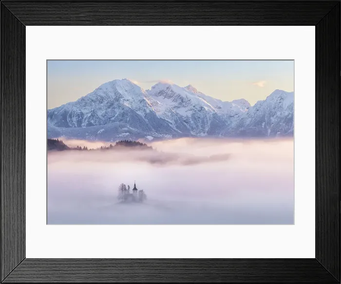 Framed Print : Church of St. Thomas and the Kamink Savinja Alps in winter, Skofja Loka, Slovenia Framed Print : Church of St. Thomas and the Kamink Savinja Alps in winter, Skofja Loka, Slovenia