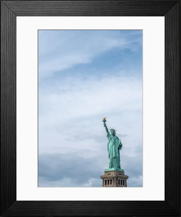 Framed Print : USA, New York, Statue of Liberty. Isolated picture of the statue with sky and copy space