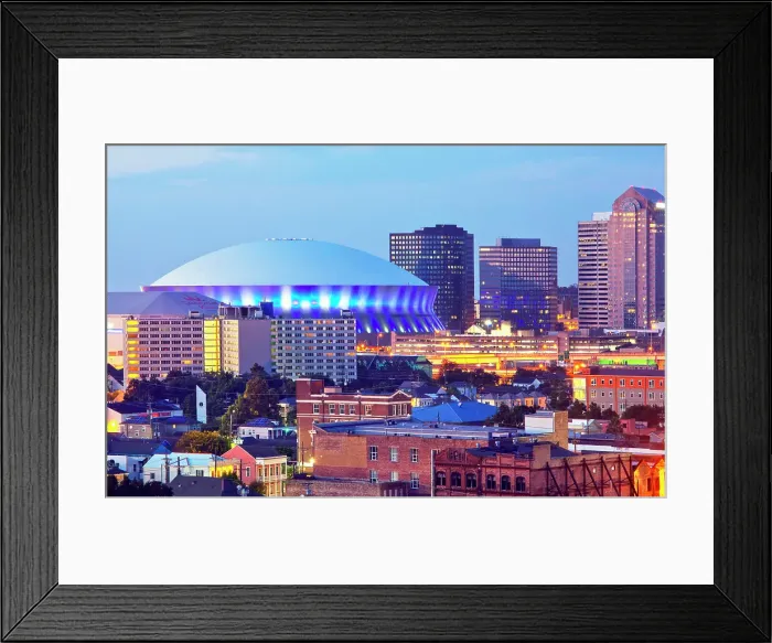 Framed Print : The Superdome, a multi-purpose stadium and home to the New Orleans Saints football team, is illuminated at dusk in the city of New Orleans, Louisiana, USA Framed Print : The Superdome, a multi-purpose stadium and home to the New Orleans Saints football team, is illuminated at dusk in the city of New Orleans, Louisiana, USA