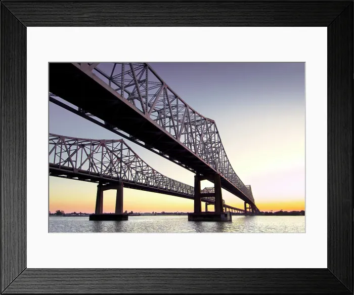 Framed Print : Crescent City Connection are twin cantilever bridges that cross over the lower Mississippi River in New Orleans. Louisiana, USA Framed Print : Crescent City Connection are twin cantilever bridges that cross over the lower Mississippi River in New Orleans. Louisiana, USA