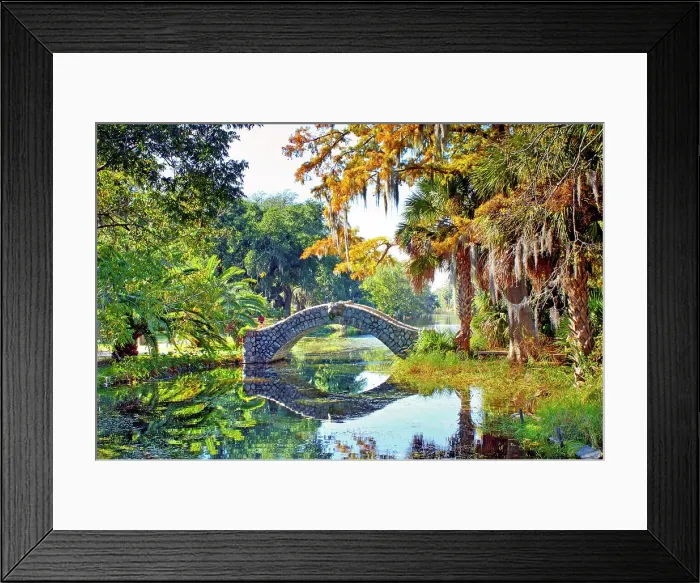 Framed Print : Langles Bridge, built in 1902, is an old stone bridge that crosses a preserved bayou in City Park, New Orleans. The park holds the world's largest collection of mature live oaks. Louisiana, USA Framed Print : Langles Bridge, built in 1902, is an old stone bridge that crosses a preserved bayou in City Park, New Orleans. The park holds the world's largest collection of mature live oaks. Louisiana, USA