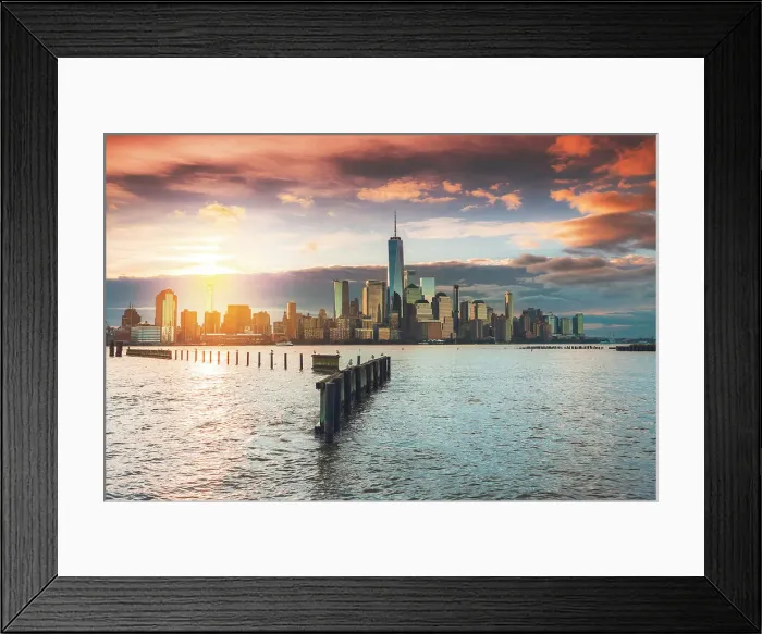 Framed Print : USA, New York City, View of New York city from Jersey city with the sun rising above the Financial district Framed Print : USA, New York City, View of New York city from Jersey city with the sun rising above the Financial district