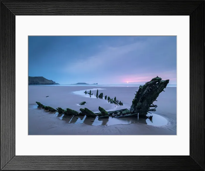 Framed Print : Sunset over the shipwreck of the Helvatia on Rhossili Bay, Gower, South Wales, UK. Spring (March) 2022 Framed Print : Sunset over the shipwreck of the Helvatia on Rhossili Bay, Gower, South Wales, UK. Spring (March) 2022