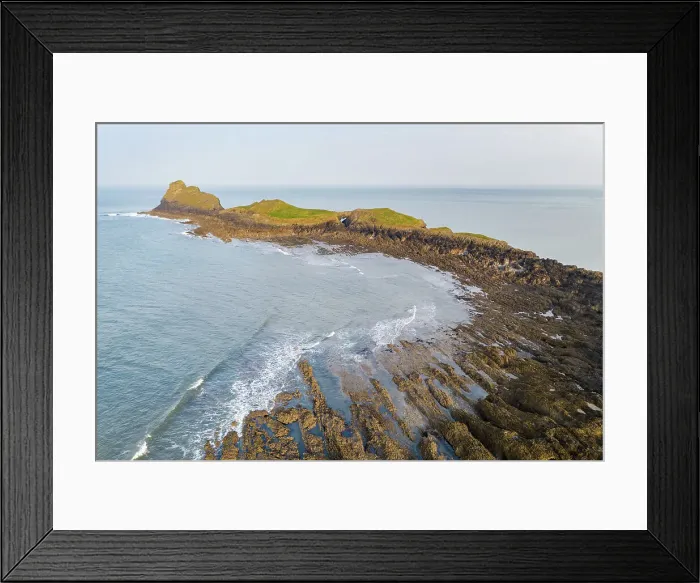 Framed Print : Aerial view of Worm's Head promontory on the Gower Peninsula, South Wales, UK. Spring (March) 2022 Framed Print : Aerial view of Worm's Head promontory on the Gower Peninsula, South Wales, UK. Spring (March) 2022