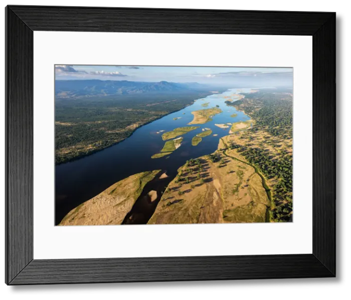 Framed Print : Aerial of Zambezi River. Zambia on left, Zimbabwe on right, Zimbabwe Framed Print : Aerial of Zambezi River. Zambia on left, Zimbabwe on right, Zimbabwe