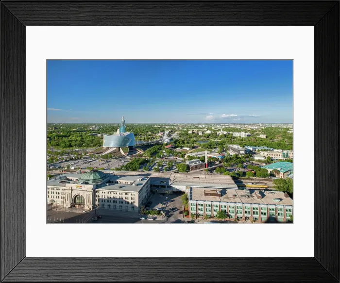 Framed Print : Aerial view of Winnipeg City looking eastward with Winnipeg train station and Northwest Company in front and the Canadian Museum for Human Rights, Winnipeg, Manitoba, Canada Framed Print : Aerial view of Winnipeg City looking eastward with Winnipeg train station and Northwest Company in front and the Canadian Museum for Human Rights, Winnipeg, Manitoba, Canada