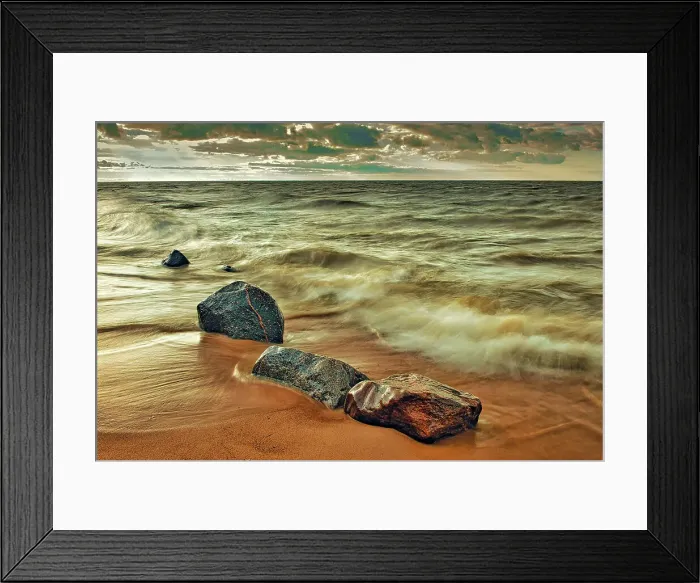 Framed Print : Waves crashing against the rocky shoreline of Lake Winnipeg at sunset Hillside Beach, Manitoba, Canada